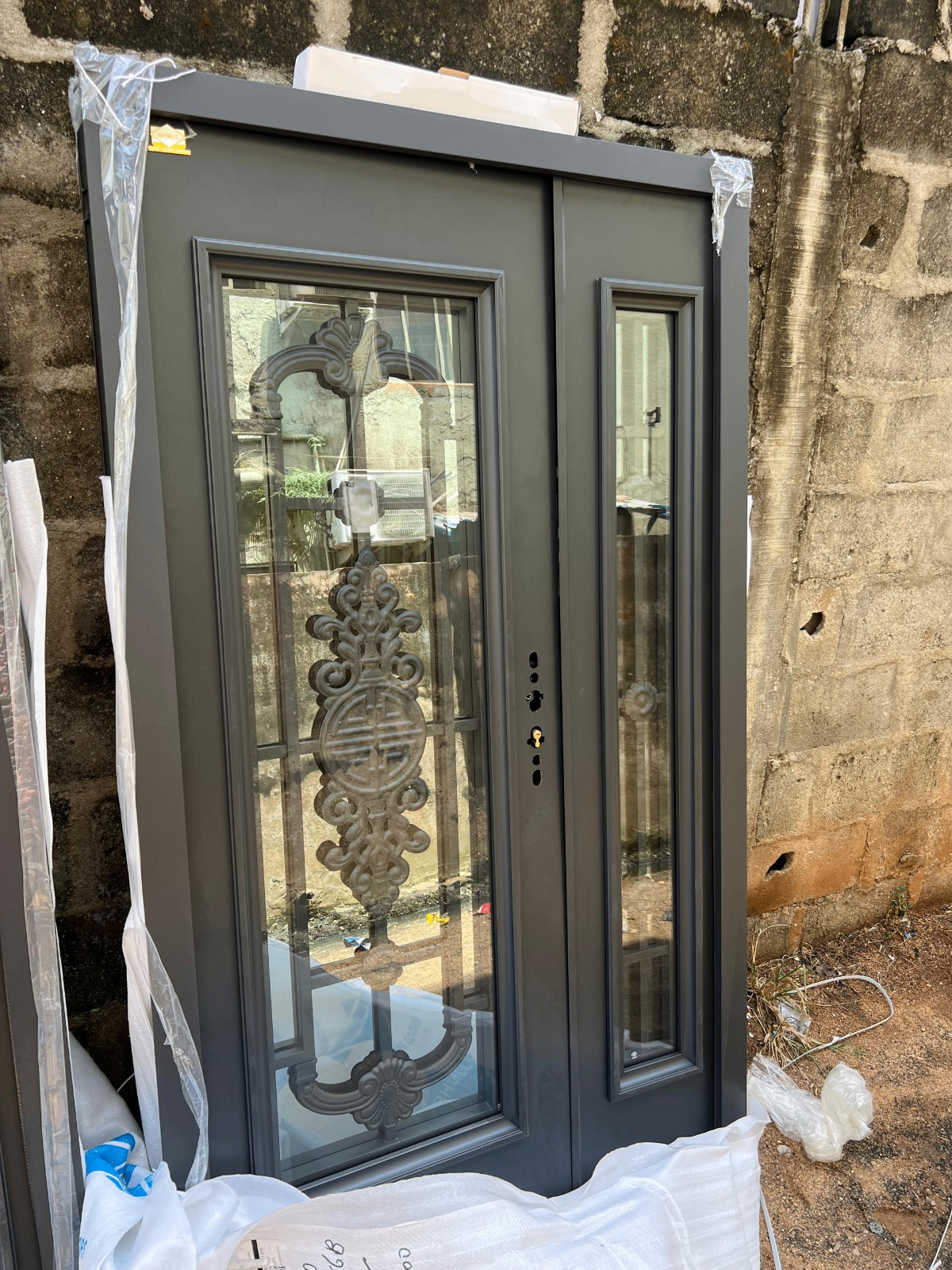 Charcoal Filigree Iron Glass Entry Door — Doors